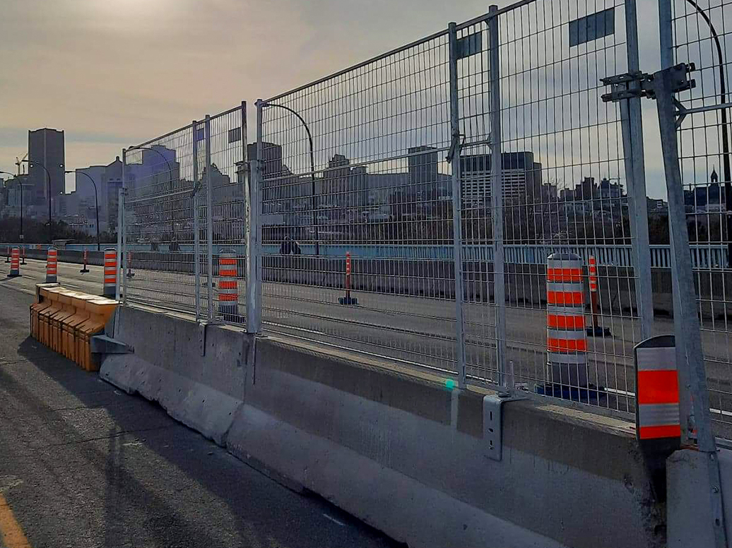 Fence on Jersey Barrier