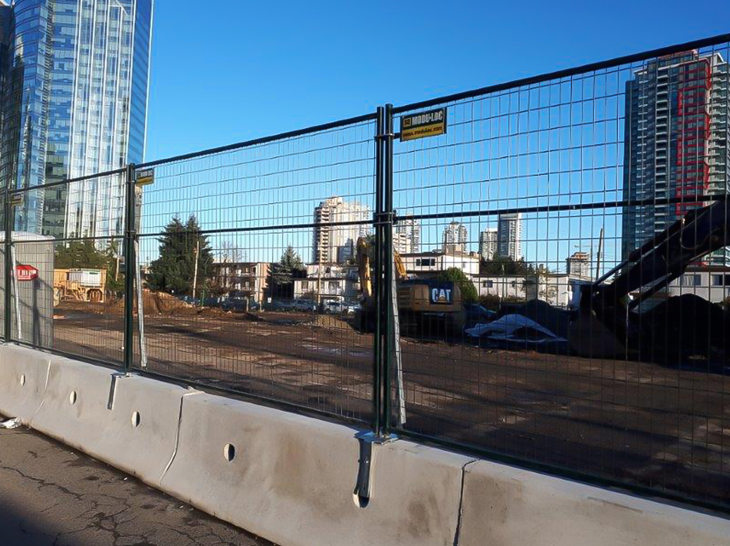 Fence on Jersey Barrier
