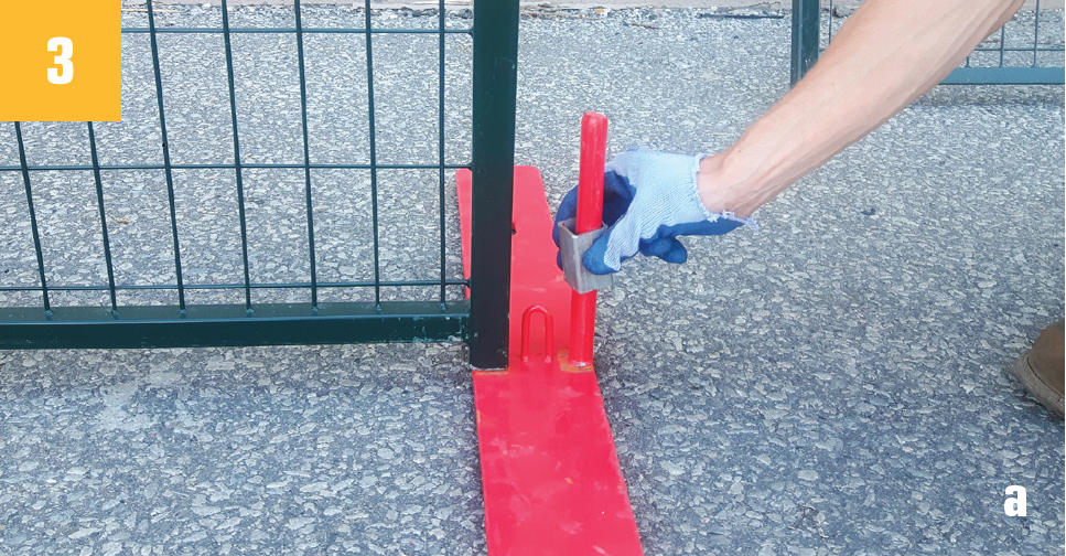Fence Guy placing spacer on fence base