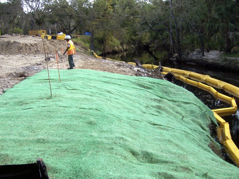 An erosion control blanket being used to prevent surface runoff