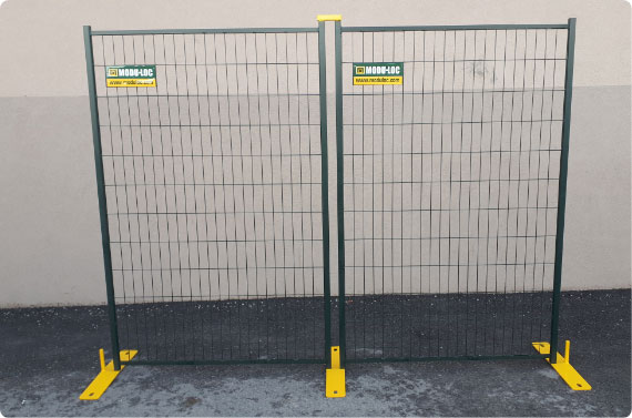 Two small steel temporary fence panels installed to form a short fence line